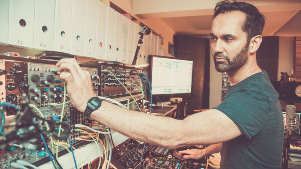 Punjabtronix residency - image of DJ Swami in the studio
