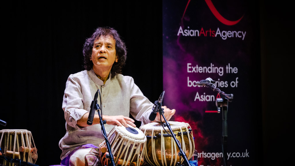 Zakir Hussain performing